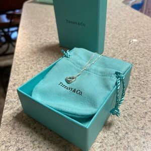 TIFFANY & CO silver open heart pendant. NWOT
